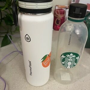 Starbucks water plastic cup
And thermos water bottle